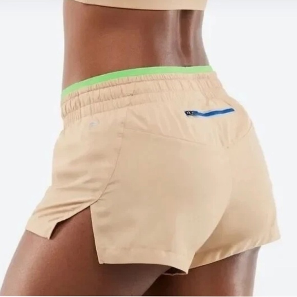 Women’s Fabletics Mid Rise run Shorts, cedar/ parakeet, Size Large 3.5” - Picture 1 of 6